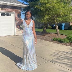 Size 8 Jovani Dress. Worn once for prom! Beautiful white iridescent dress.